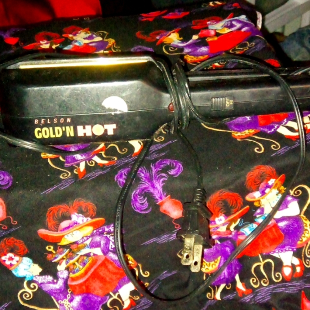 Nelson gold and hot straightner